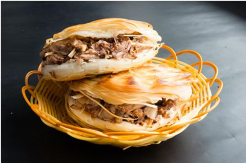 賣(mài)肉夾饃帶“潼關(guān)”倆字需交99800元？